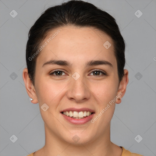 Joyful white young-adult female with short  brown hair and brown eyes