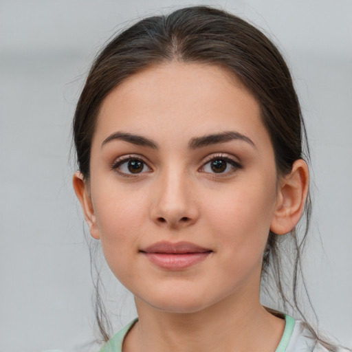 Neutral white young-adult female with medium  brown hair and brown eyes