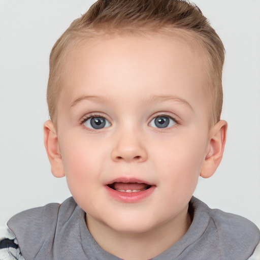 Joyful white child female with short  brown hair and grey eyes