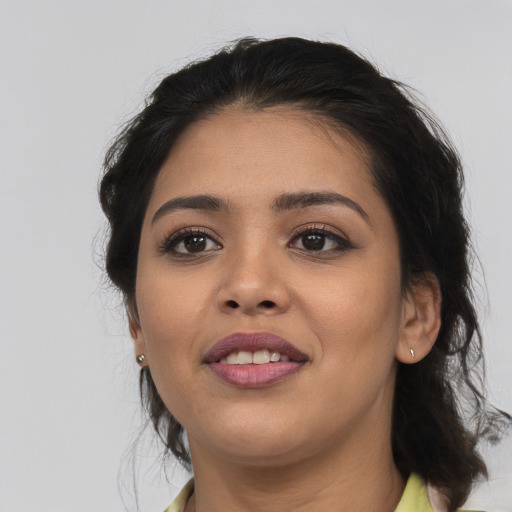 Joyful asian young-adult female with medium  brown hair and brown eyes