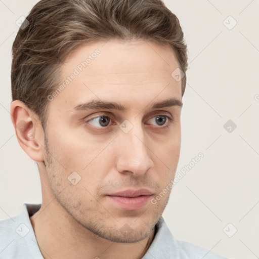 Neutral white young-adult male with short  brown hair and grey eyes