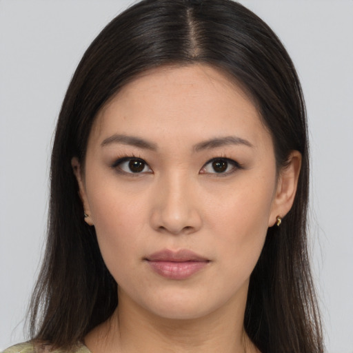 Neutral asian young-adult female with long  brown hair and brown eyes