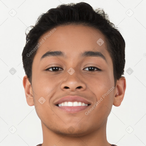 Joyful latino young-adult male with short  brown hair and brown eyes