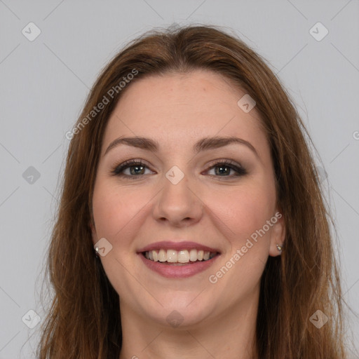 Joyful white young-adult female with long  brown hair and grey eyes