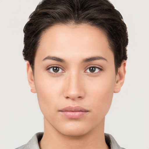 Neutral white young-adult female with short  brown hair and brown eyes