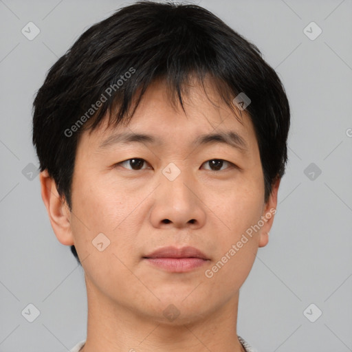 Neutral asian young-adult male with short  brown hair and brown eyes