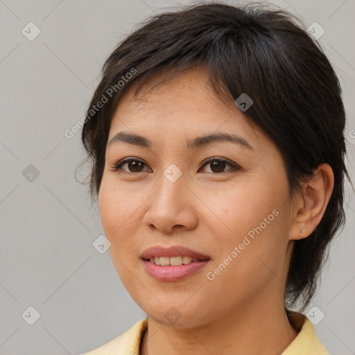 Joyful white young-adult female with medium  brown hair and brown eyes