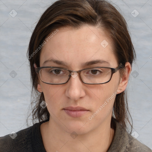 Joyful white adult female with medium  brown hair and grey eyes