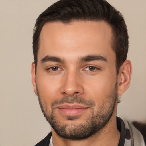 Joyful white young-adult male with short  brown hair and brown eyes