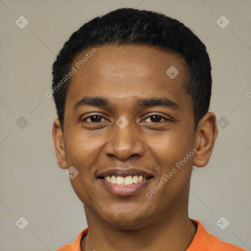 Joyful black young-adult male with short  black hair and brown eyes