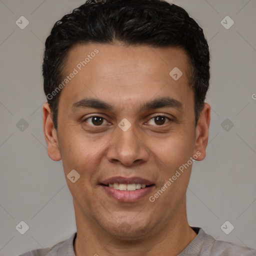Joyful white young-adult male with short  black hair and brown eyes