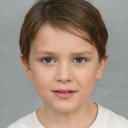 Joyful white child female with short  brown hair and brown eyes