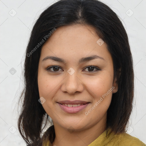 Joyful latino young-adult female with medium  brown hair and brown eyes