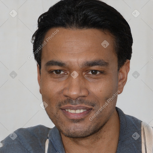 Joyful latino young-adult male with short  black hair and brown eyes