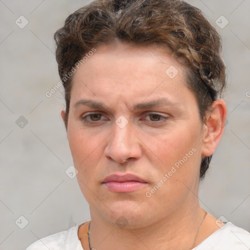 Joyful white adult female with short  brown hair and brown eyes