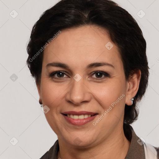 Joyful white adult female with medium  brown hair and brown eyes