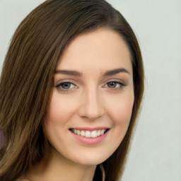 Joyful white young-adult female with long  brown hair and green eyes