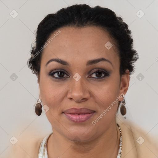 Joyful black young-adult female with long  brown hair and brown eyes