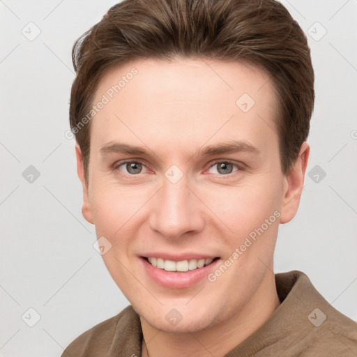 Joyful white young-adult female with short  brown hair and grey eyes