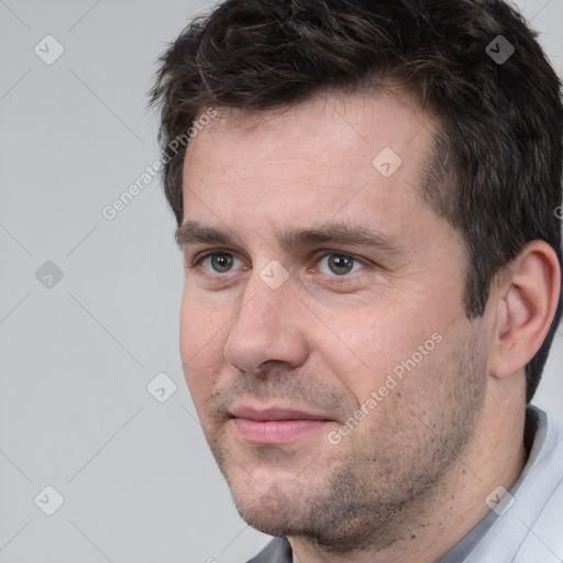 Neutral white adult male with short  brown hair and brown eyes