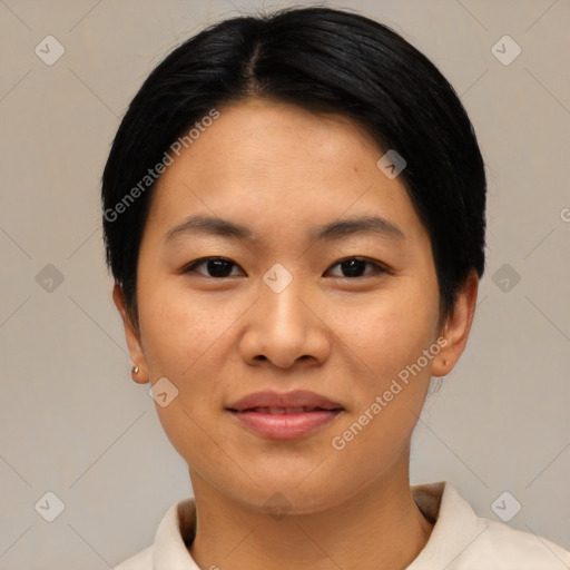 Joyful asian young-adult female with short  black hair and brown eyes