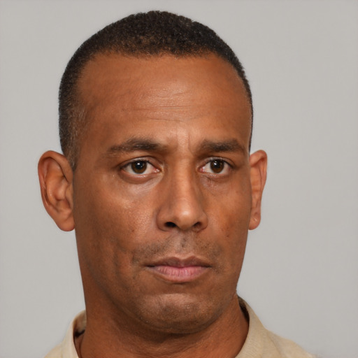 Neutral black adult male with short  black hair and brown eyes