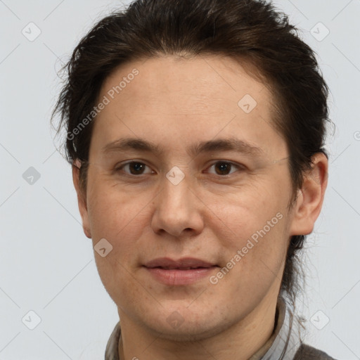 Joyful white adult female with short  brown hair and brown eyes