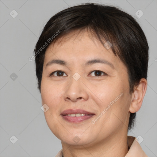 Joyful white adult female with short  brown hair and brown eyes