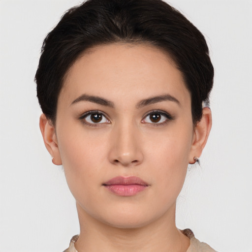 Neutral white young-adult female with short  brown hair and brown eyes