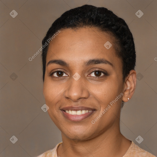 Joyful latino young-adult female with short  black hair and brown eyes