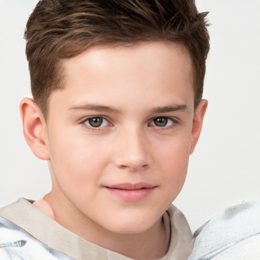 Joyful white child male with short  brown hair and brown eyes