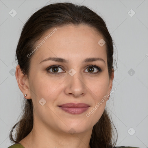 Joyful white young-adult female with medium  brown hair and brown eyes