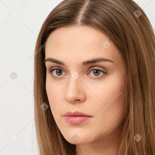 Neutral white young-adult female with long  brown hair and brown eyes