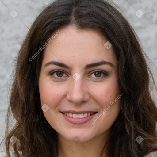 Joyful white young-adult female with long  brown hair and green eyes