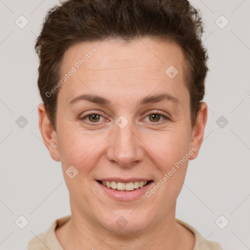 Joyful white adult female with short  brown hair and brown eyes