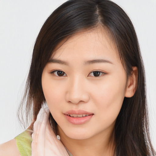 Neutral asian young-adult female with long  brown hair and brown eyes