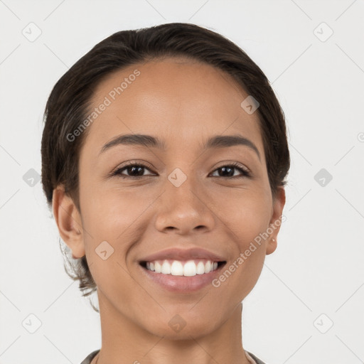 Joyful white young-adult female with short  brown hair and brown eyes