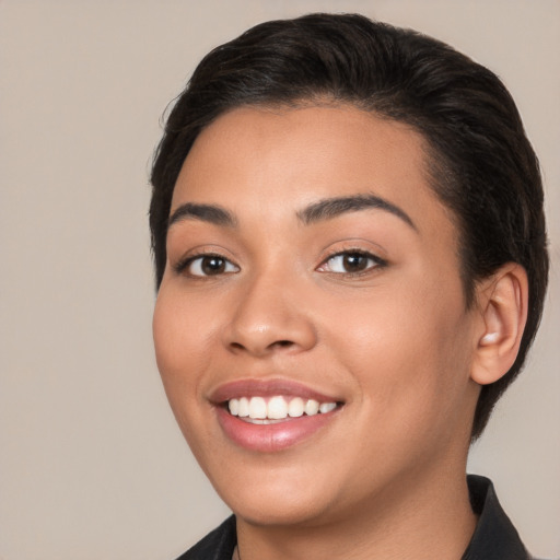 Joyful white young-adult female with short  brown hair and brown eyes