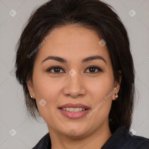 Joyful white adult female with medium  brown hair and brown eyes