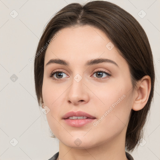 Neutral white young-adult female with medium  brown hair and brown eyes