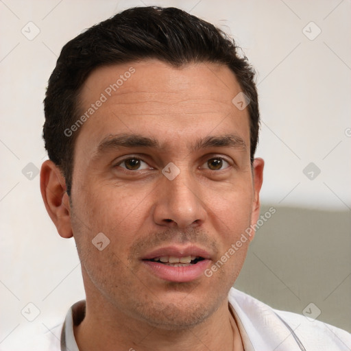 Joyful white adult male with short  brown hair and brown eyes