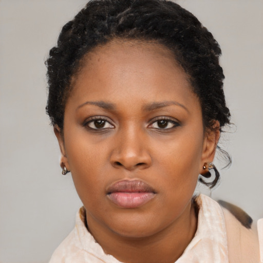 Neutral black young-adult female with short  black hair and brown eyes