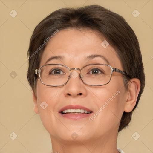 Joyful white adult female with short  brown hair and brown eyes