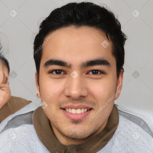 Joyful latino young-adult male with short  brown hair and brown eyes