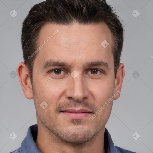 Joyful white adult male with short  brown hair and brown eyes