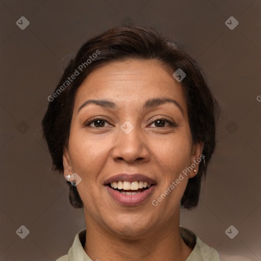 Joyful white adult female with short  brown hair and brown eyes
