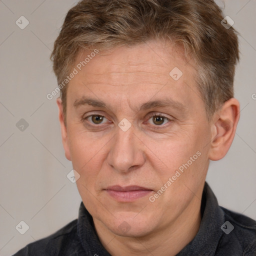 Joyful white middle-aged male with short  brown hair and brown eyes