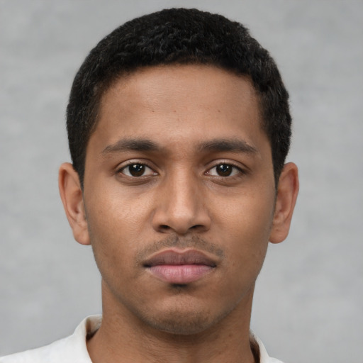 Neutral latino young-adult male with short  brown hair and brown eyes