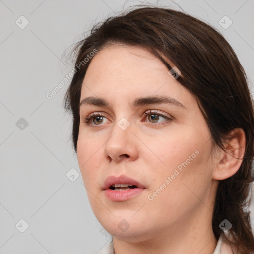 Neutral white young-adult female with medium  brown hair and brown eyes