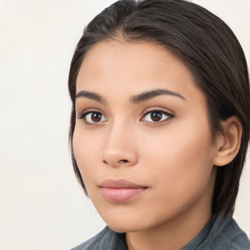 Neutral asian young-adult female with long  brown hair and brown eyes